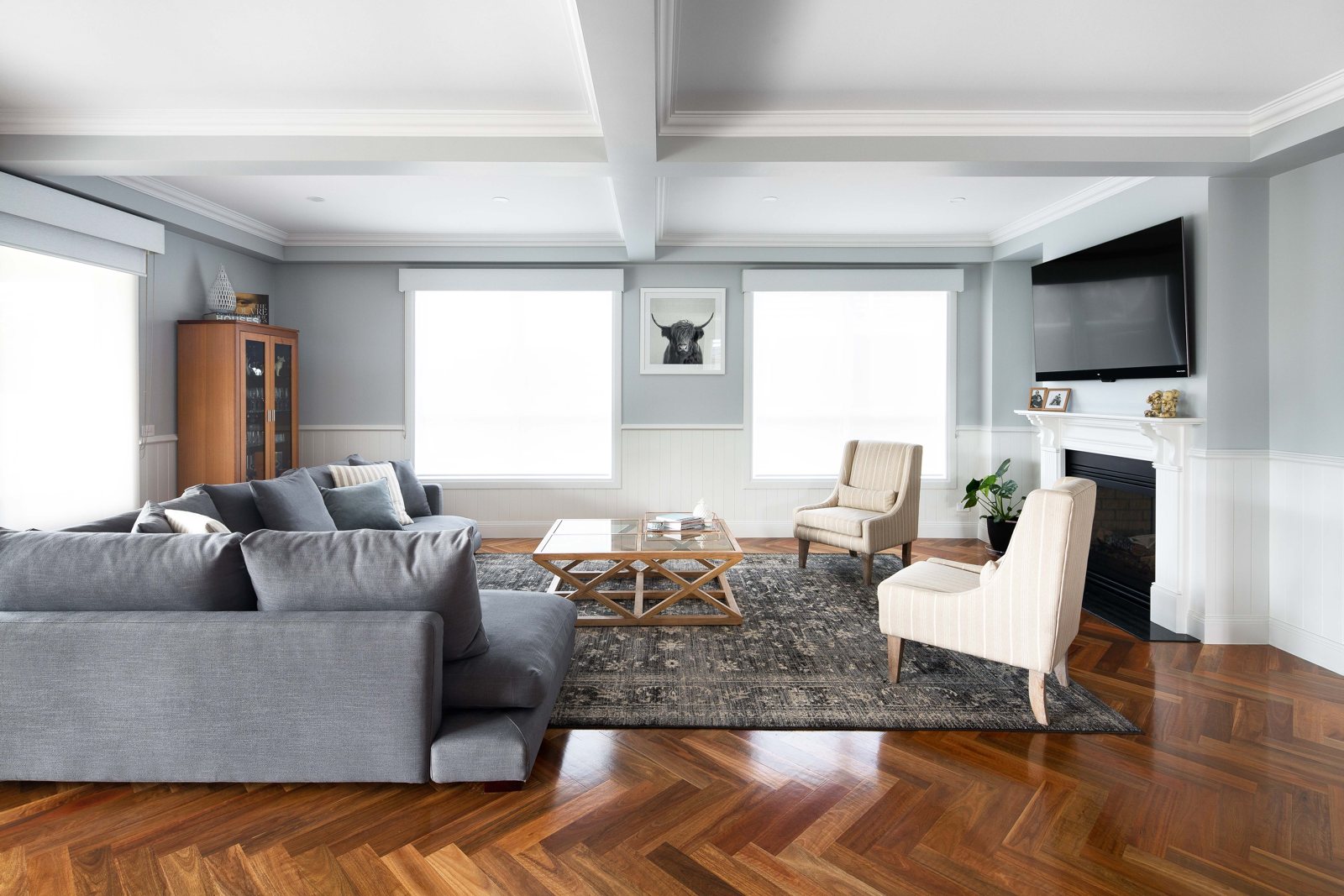 Living room with fireplace, wall panelling and herringbone floor, Civic Parade, Altona